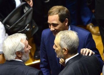 El color de la asunción: León y Andrés, la corbata, invitados y el agosto de los vendedores