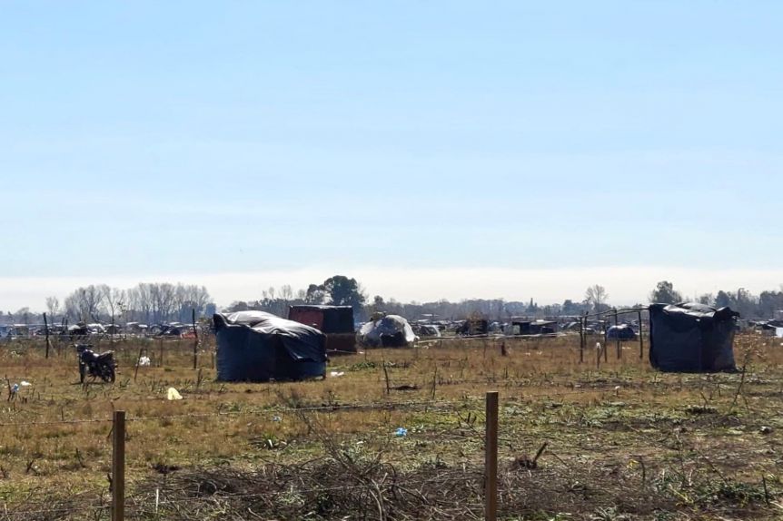 La polémica por la toma de tierras se coló en la Legislatura